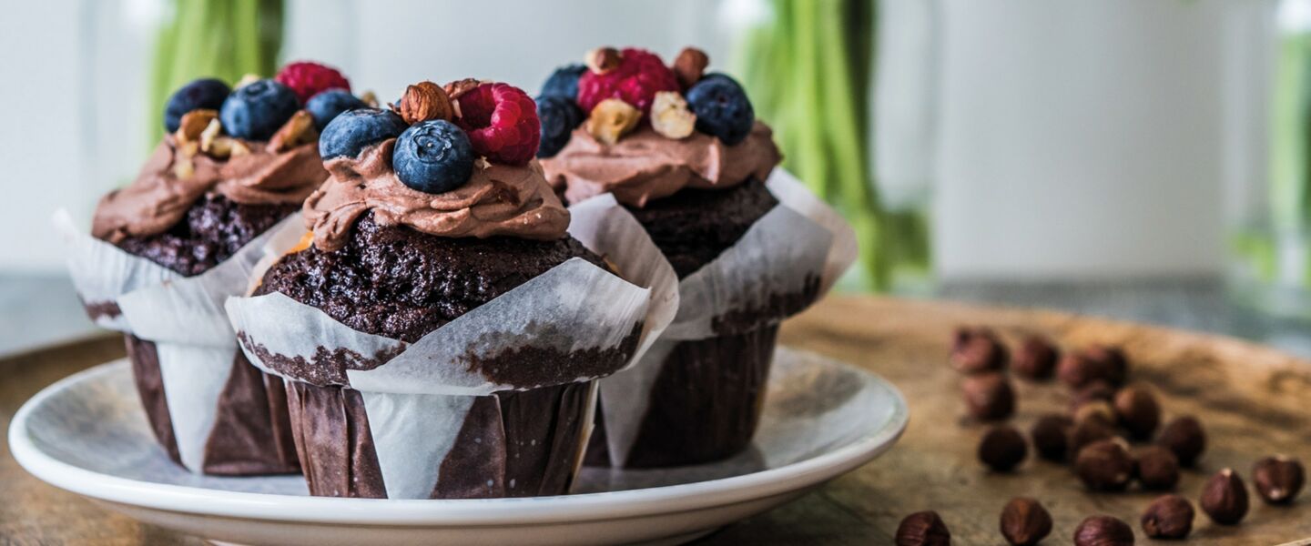 Ölz Nuss-Nougat Muffins mit Schoko-Frischkäse-Topping